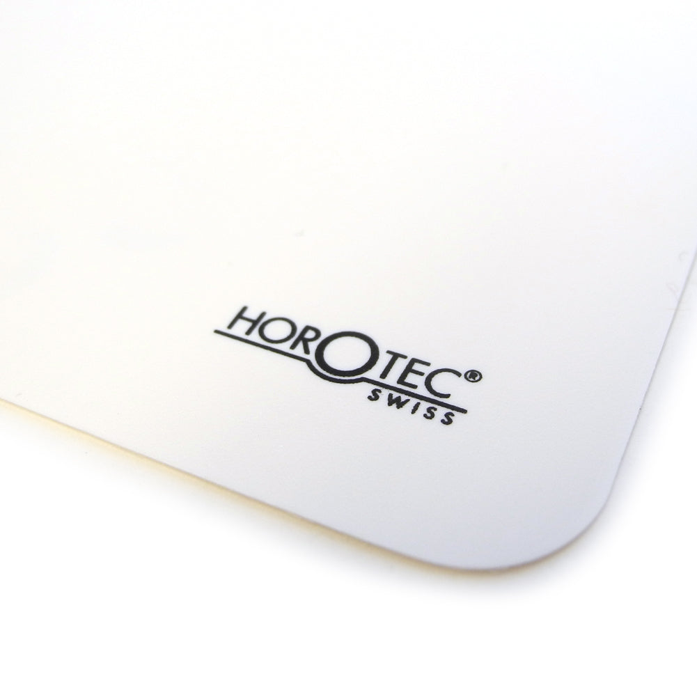 Horotec MSA24.207 white self-adhesive bench mat, 350mm x 240mm, anti-slip surface for watch repair workspace.