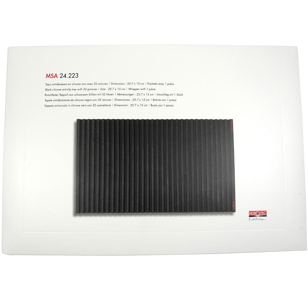 Horotec MSA24.223 black silicon anti-slip bench mat with 32 grooves for organized watch repair workspace.