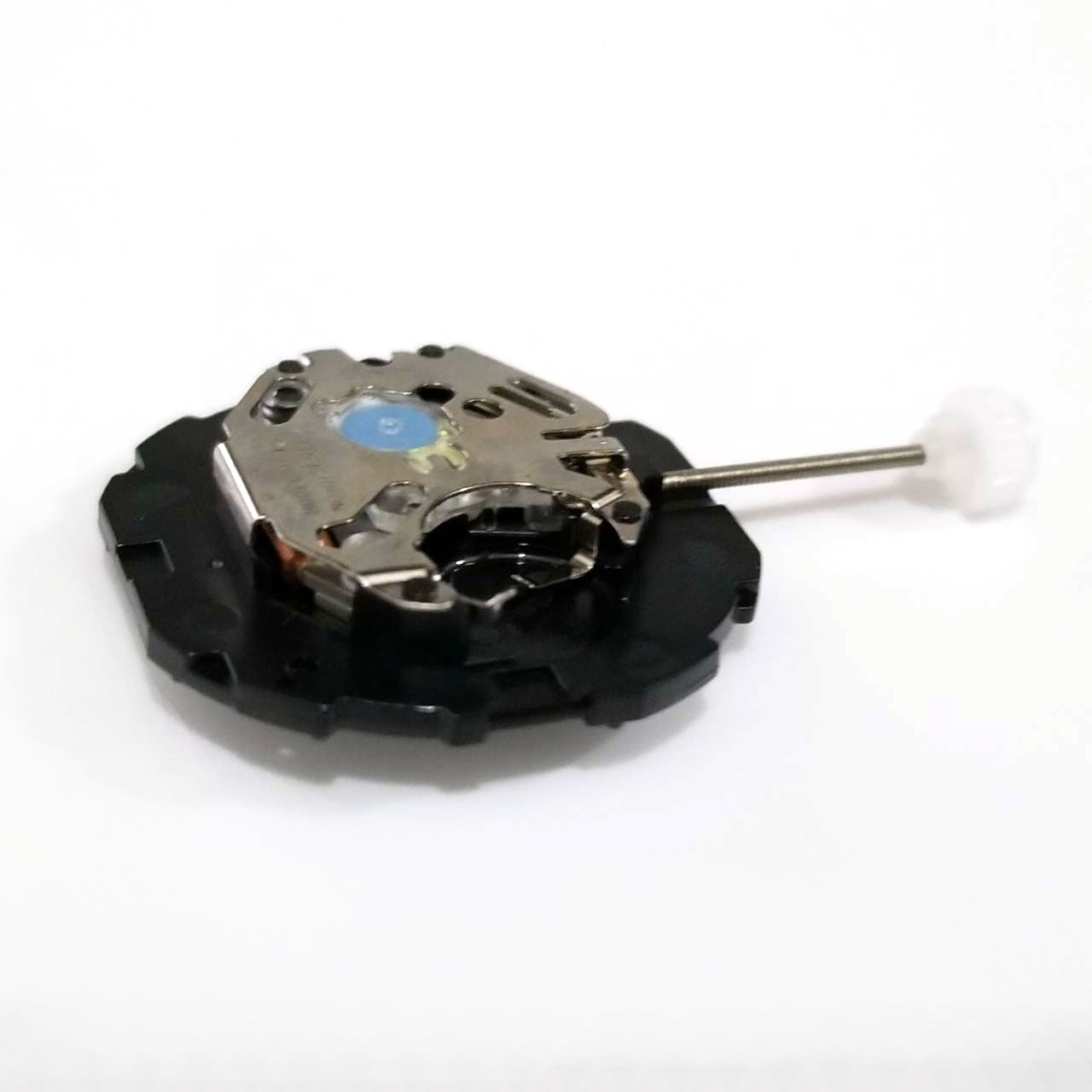 Sunon PE46 quartz watch movement featuring two hands and date window at 3 o'clock for precise timekeeping.