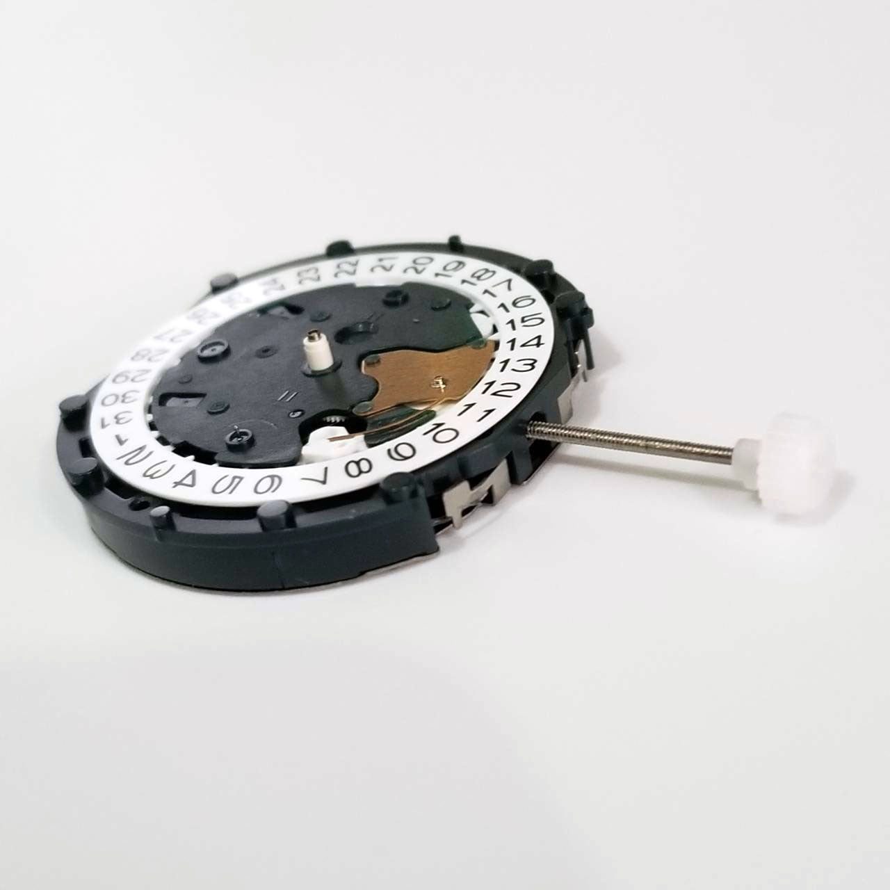 Sunon PE48 quartz watch movement with date at 3/6 and small seconds at 6/9, precise and reliable.