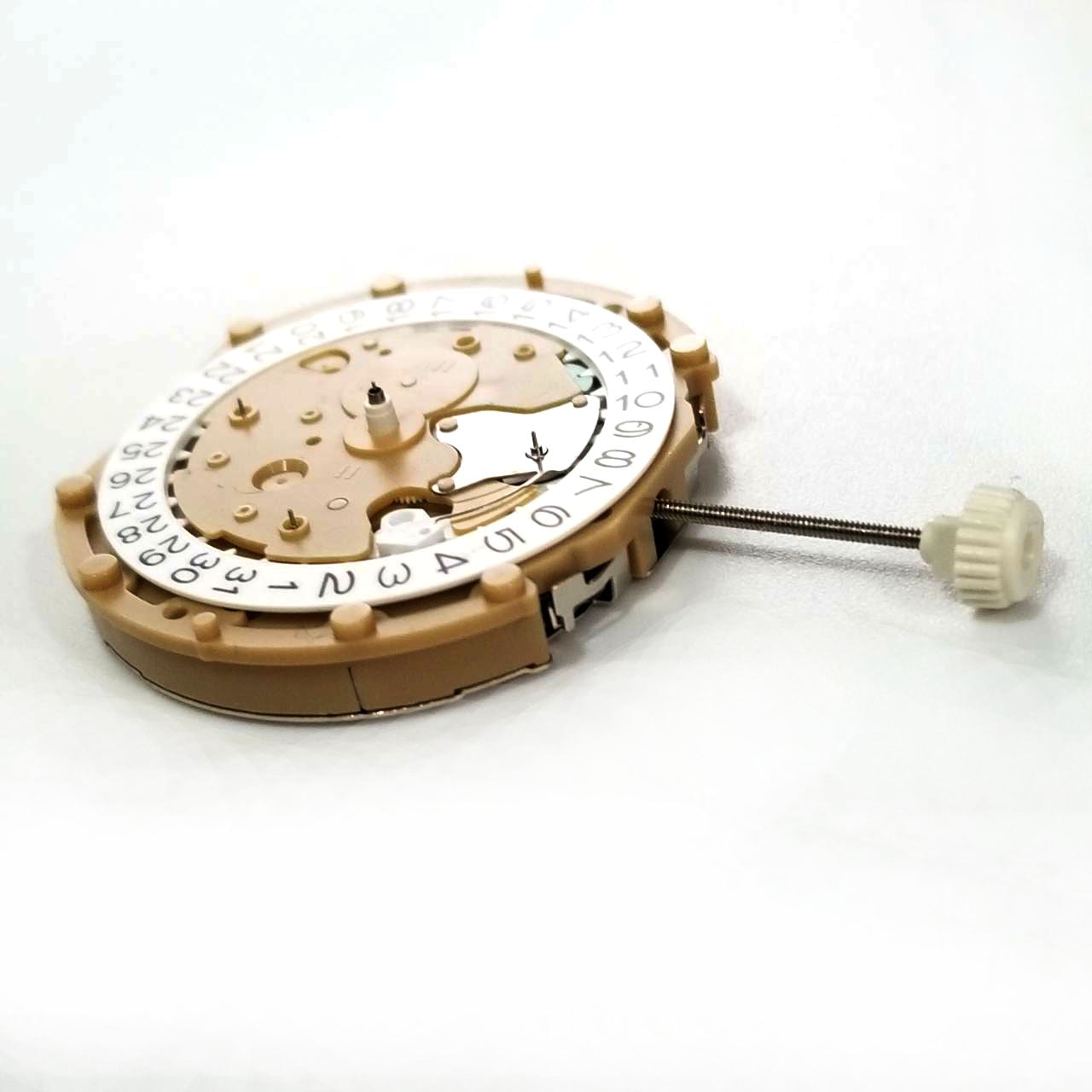 Sunon PE60 quartz watch movement with 3 hands and date, precise timekeeping for watch repairs.