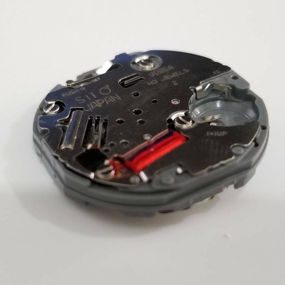 Hattori Epson VD85A quartz watch movement, Japan-made precision mechanism for reliable timekeeping.