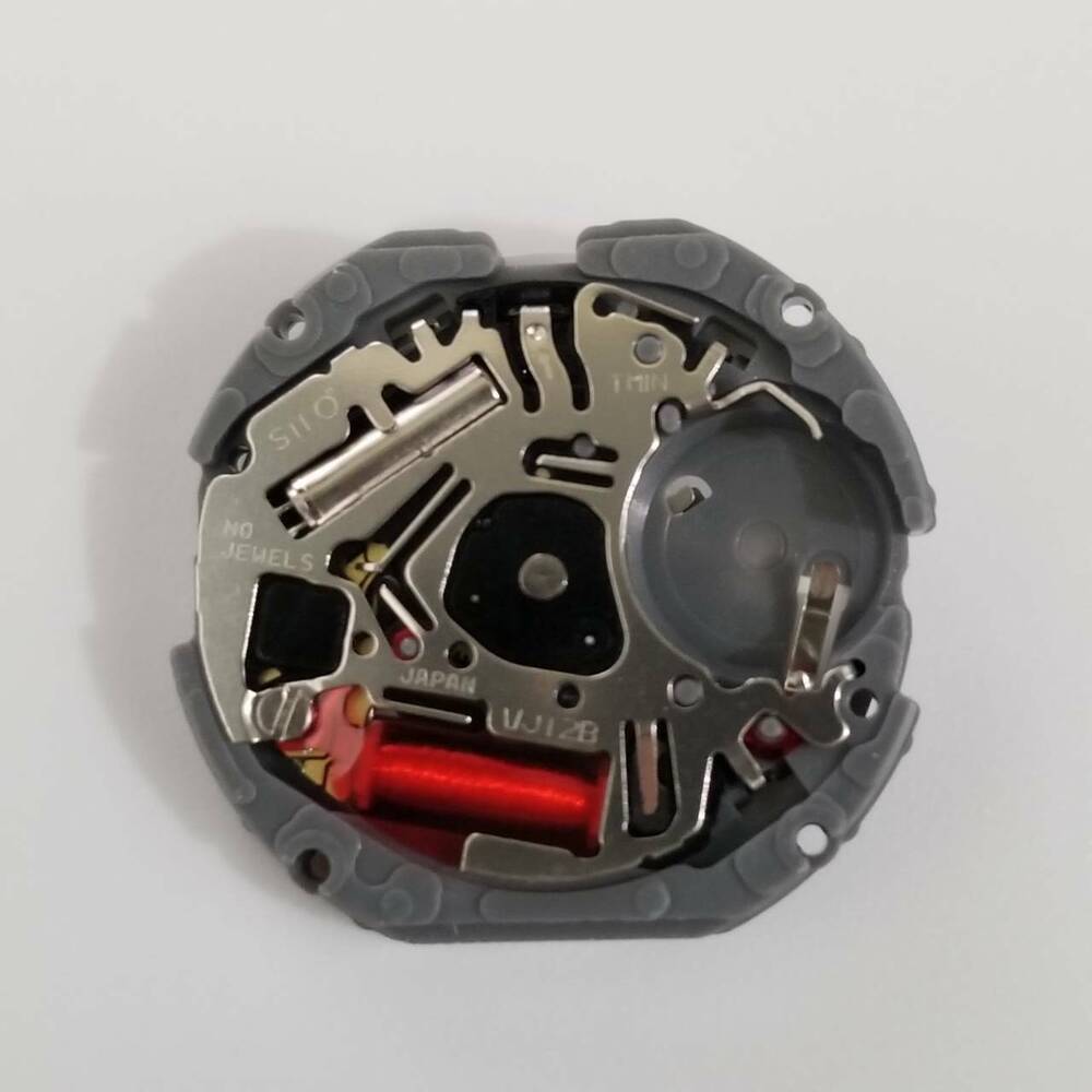 Hattori Epson TMI VJ12B quartz watch movement featuring date display at 3 o?clock, Japan-made precision.