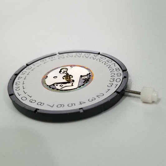 ISA 2334 quartz watch movement with date window at 3 o'clock for precise repairs.