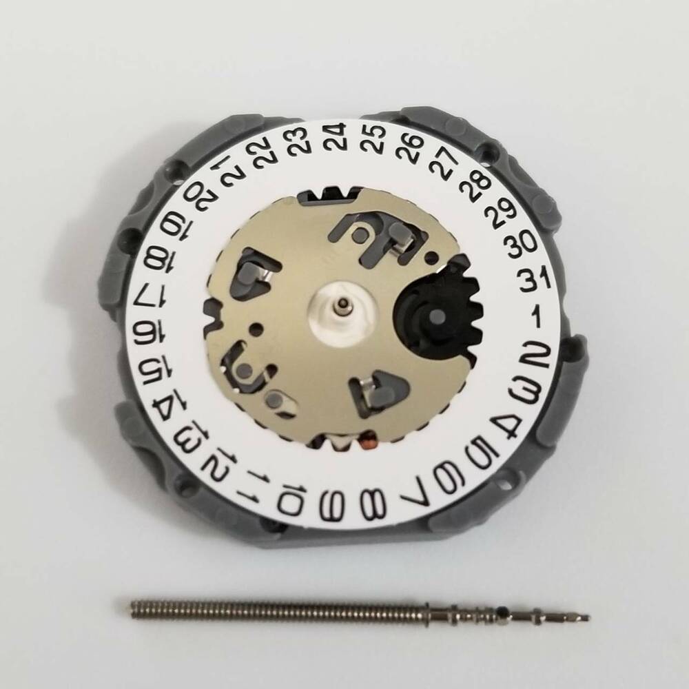 Hattori Epson TMI VJ12B quartz watch movement with date display at 3, Japan made precision.