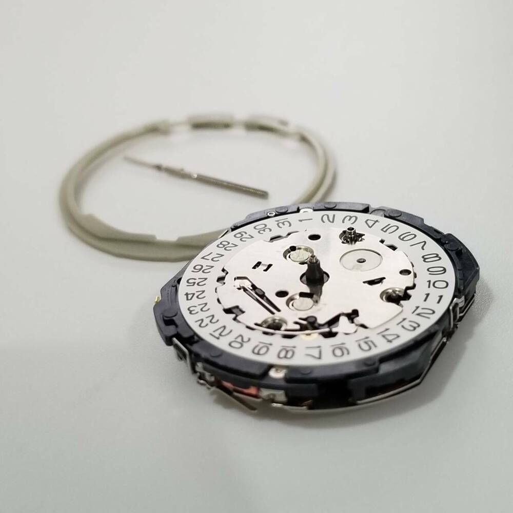 Epson YM92 quartz watch movement replacement part for precise timekeeping in watch repair.