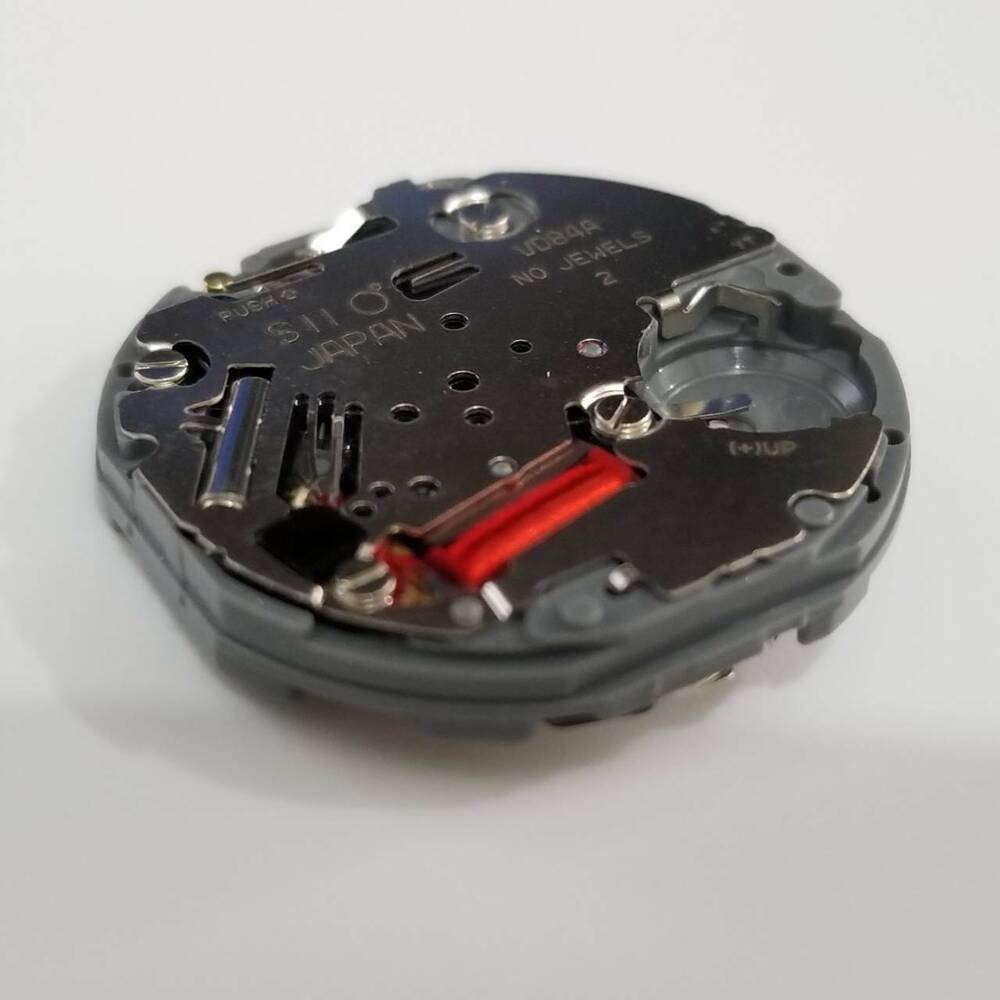 SII VD84 quartz watch repair part with 6G34 movement for accurate timekeeping maintenance.