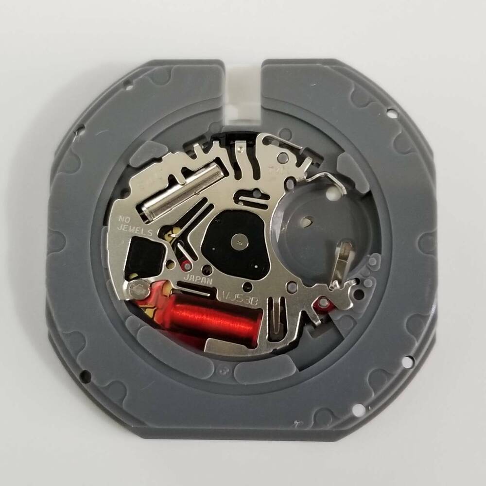 Hattori Epson TMI VJ53 quartz watch movement showcasing precise Japanese engineering for accurate timekeeping.