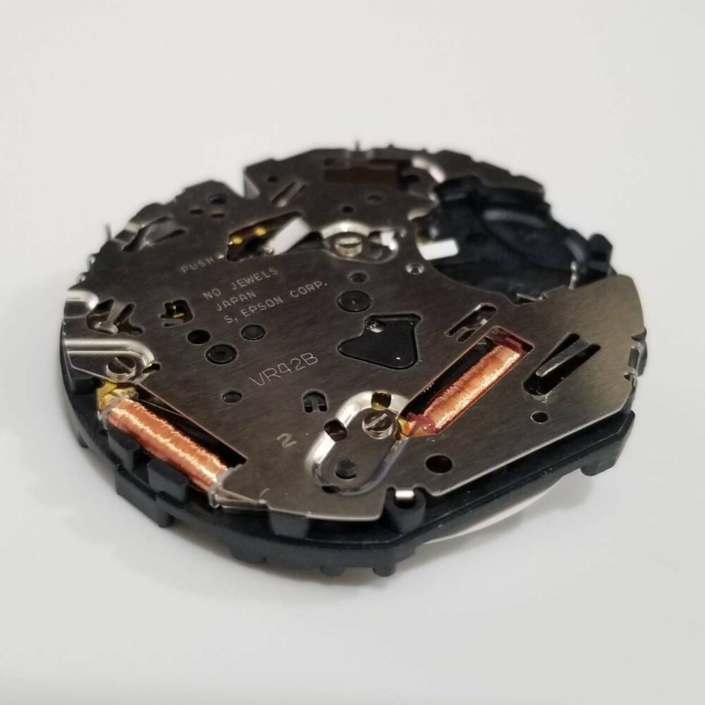 Epson VS42 solar quartz watch repair parts for V157, durable precision replacement components.