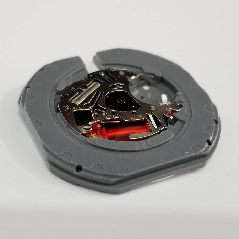 Hattori Epson TMI VJ53 quartz watch movement showcasing precision Japanese craftsmanship for reliable performance.