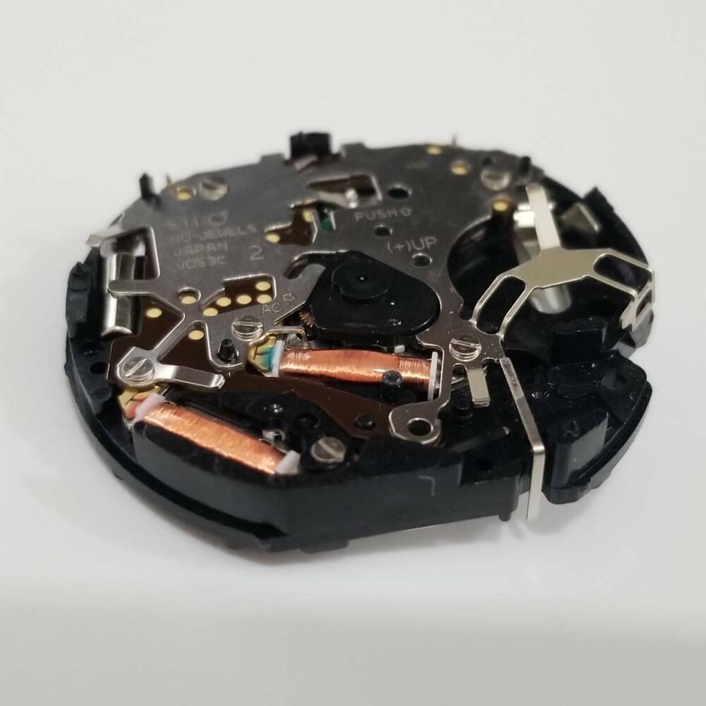 Hattori Epson VD53C quartz watch movement with date display at 3, 6, and 4:30 positions, V653 replacement.