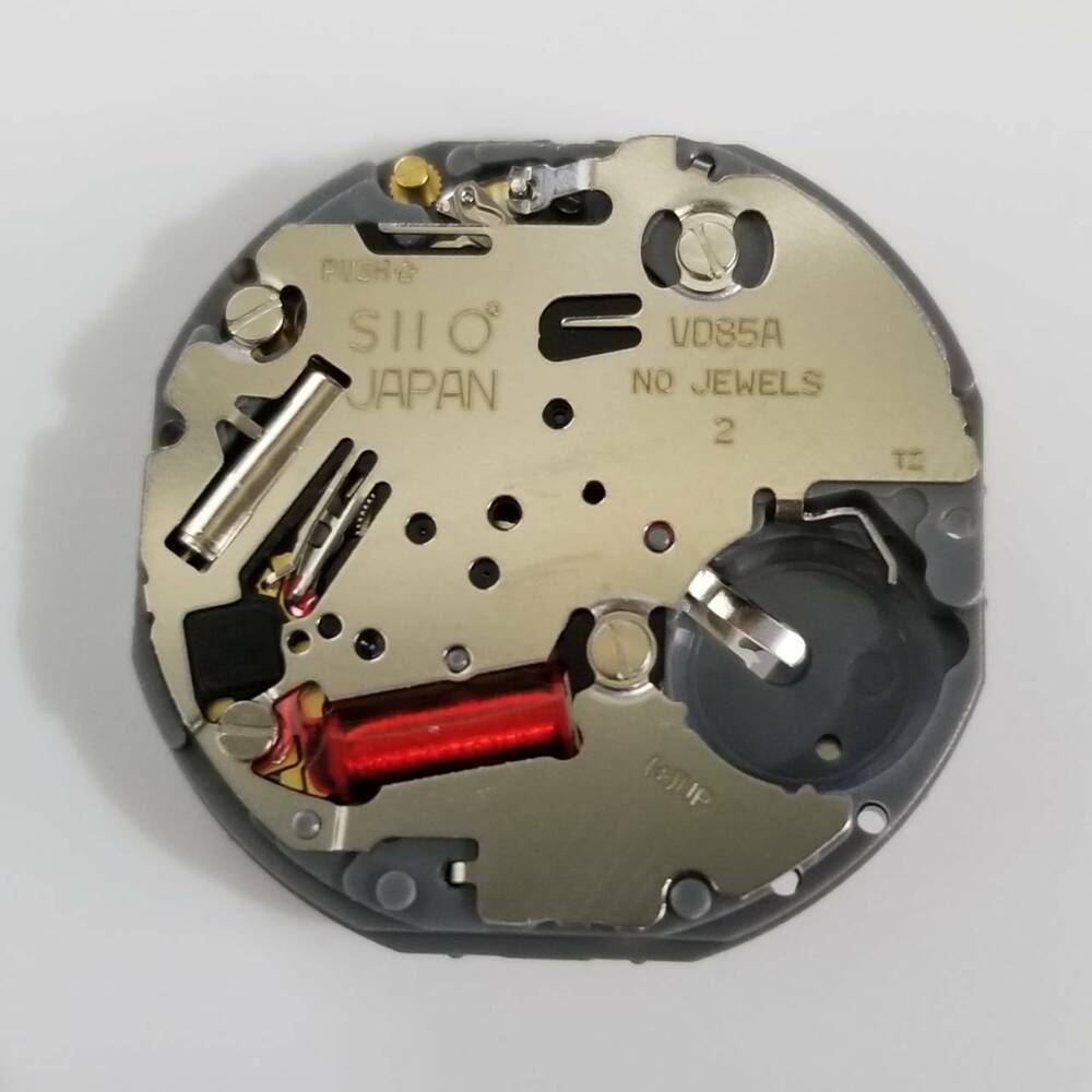 Hattori Epson VD85A quartz watch movement showing precise Japan-made mechanism for reliable timekeeping.