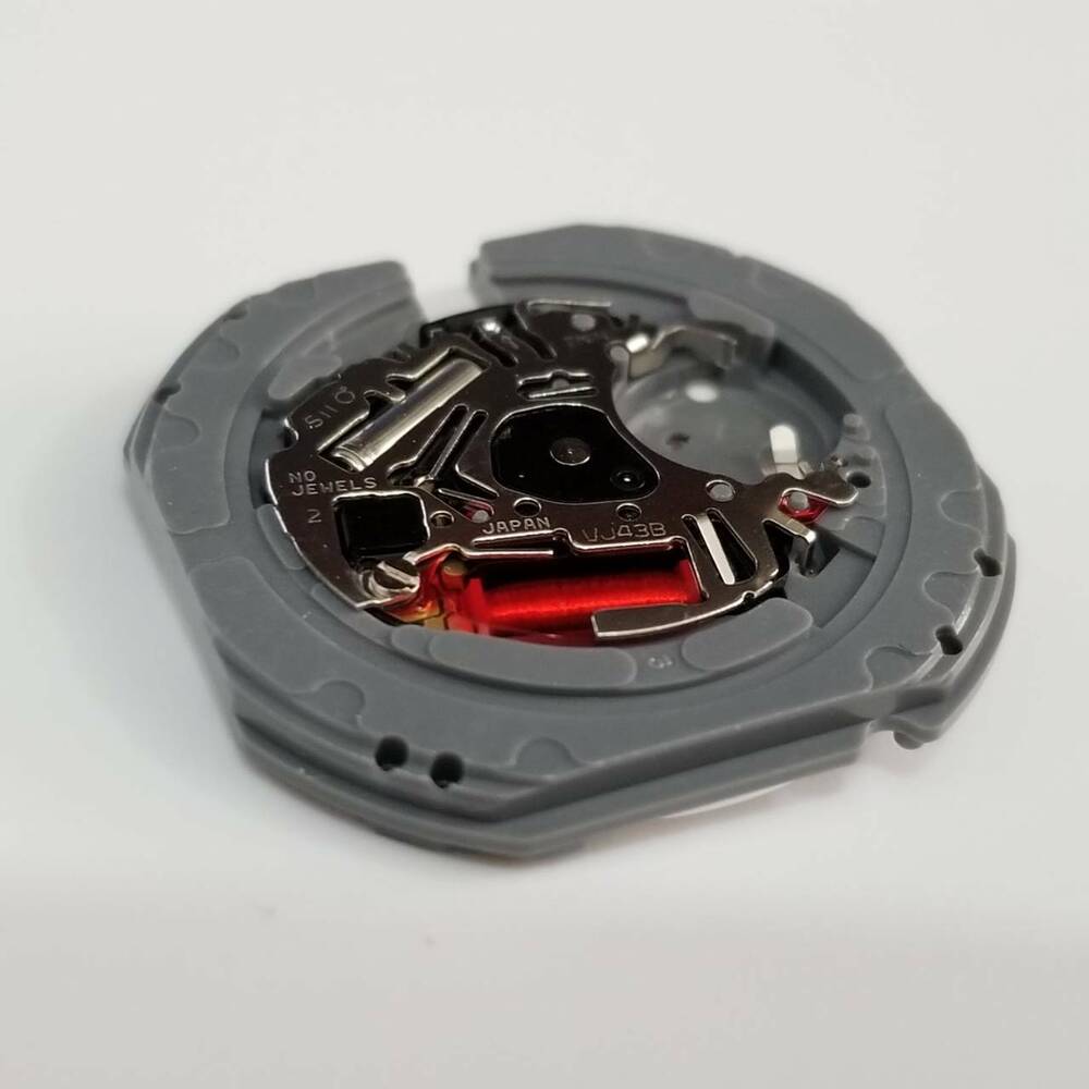 Hattori Epson TMI VJ43B quartz watch movement, precision Japan-made mechanism for accurate repairs.