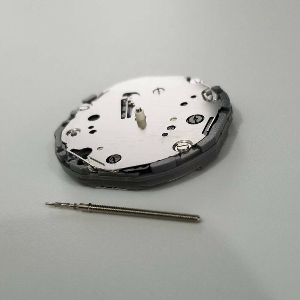 Hattori Epson VD85A quartz watch movement, precision Japan-made mechanism for accurate timekeeping.
