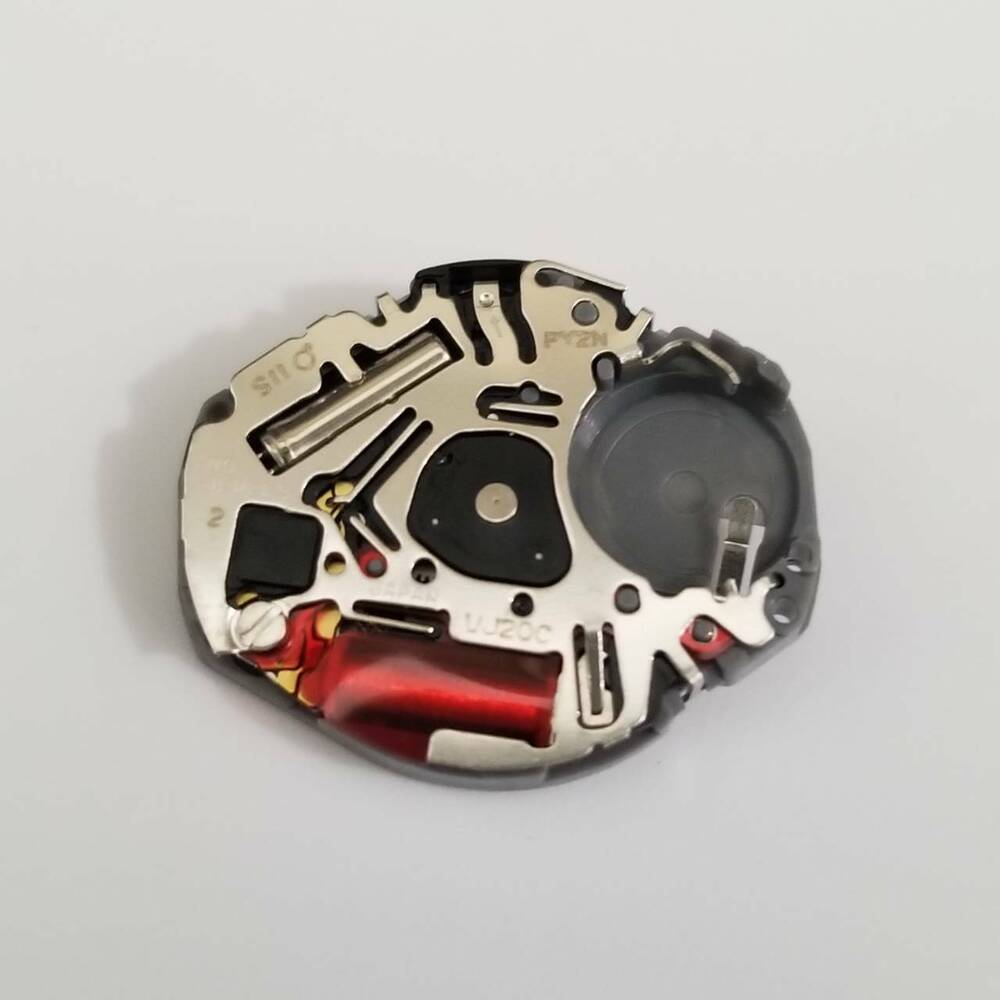 Hattori Epson TMI VJ20 quartz watch movement, precision Japan-made part for accurate watch repair.