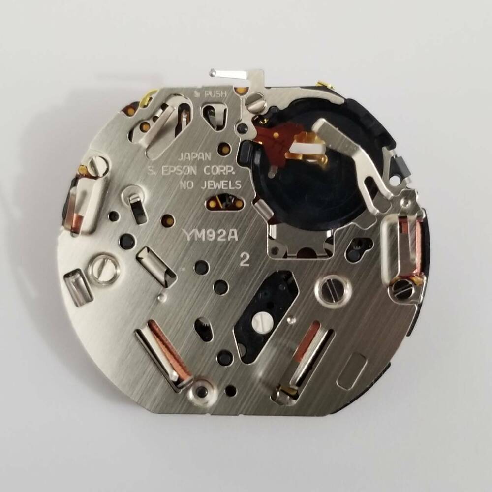 Epson YM92 quartz watch movement, precise replacement part for accurate timekeeping in watch repair.