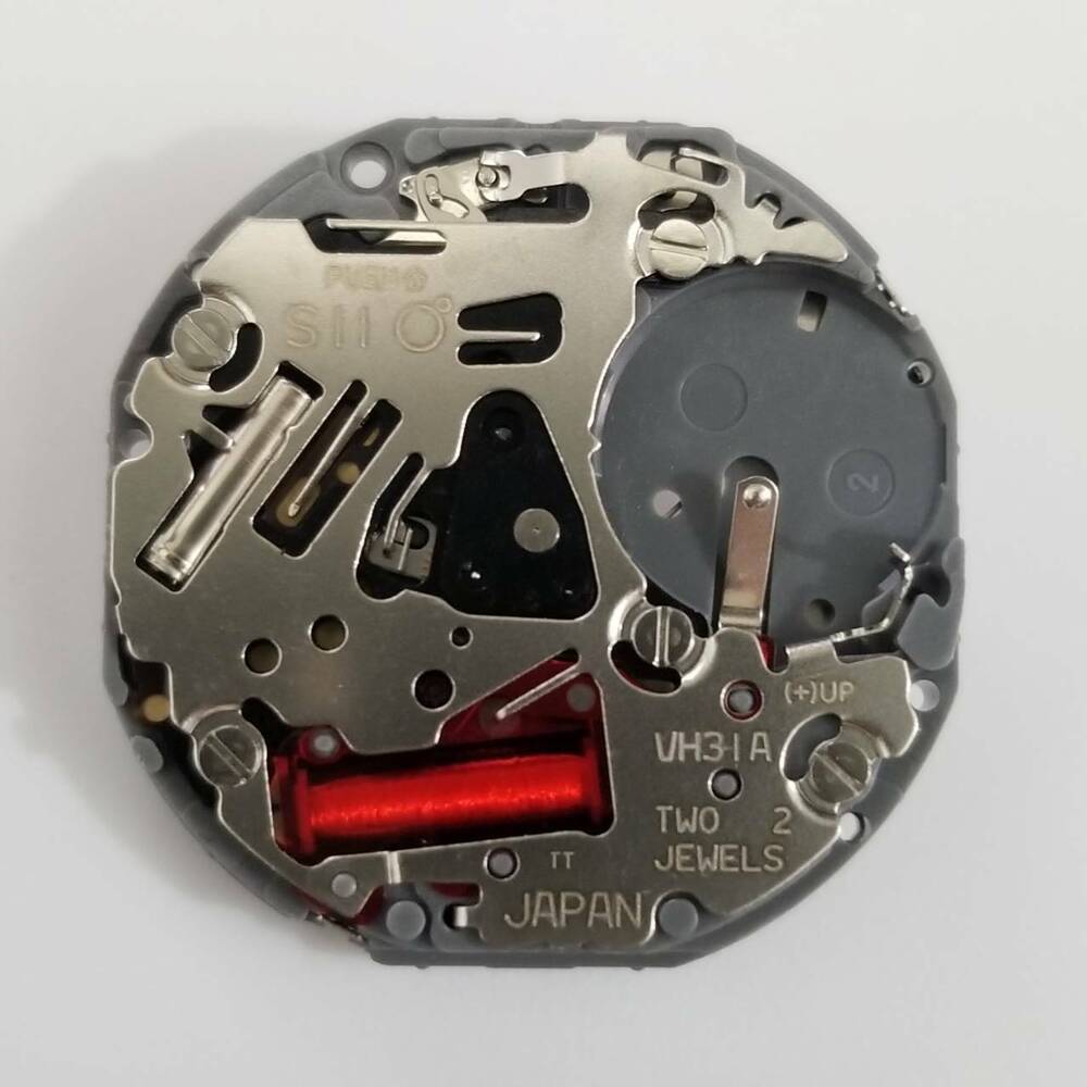 Hattori Epson VH31A quartz watch movement, precise Japanese mechanism for accurate watch repair and assembly.