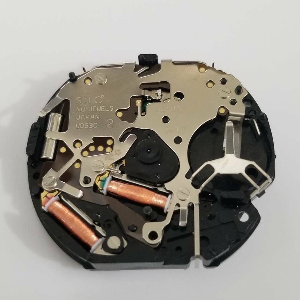 Hattori Epson VD53C quartz watch movement with date at 3, 6, and 4:30 positions, replacement V653.