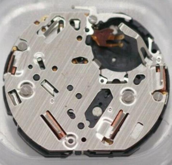 Hattori Epson TMI YM9G quartz watch movement, precision Japan-made mechanism for accurate timekeeping in watch accessories.