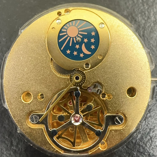 Golden mechanical watch repair part with moon phase at 12 and flywheel, China made for precision timing.