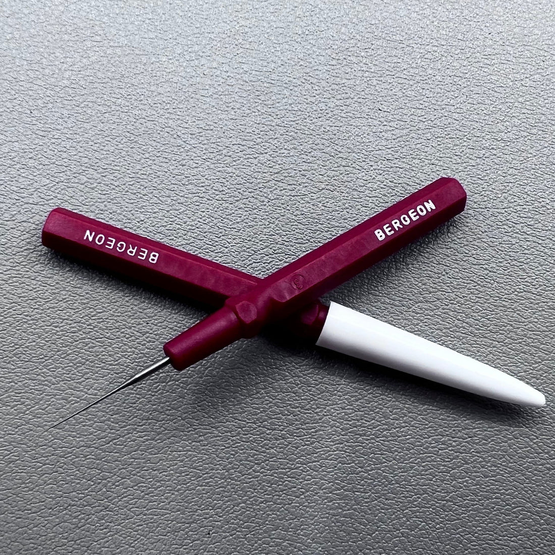 Swiss Bergeon 30102-A fine red watch dip oilers for precise lubrication of delicate watch parts.