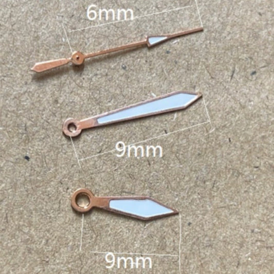 Rose gold trimmed green lume watch hands, 9x9x6mm, compatible with Miyota 2035 quartz movement.