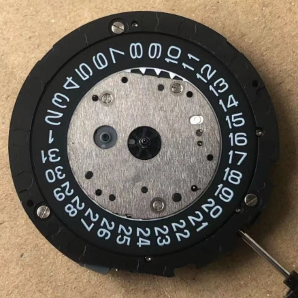 Miyota 6S21 quartz movement with black date disk for precise watch repairs and replacements.