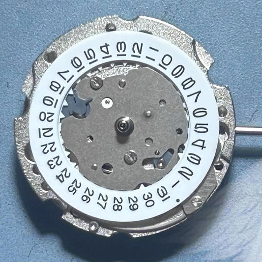 Miyota 6T15 mechanical watch movement with date at 3, precision Japan-made component for watch repair.