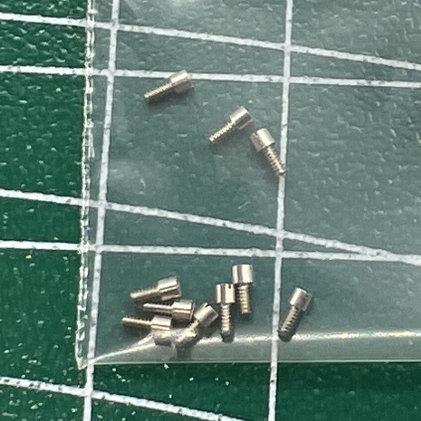 Wholesale Screws for Watch Dial Feet compatible with China Made 7120 Movement, durable precision parts.