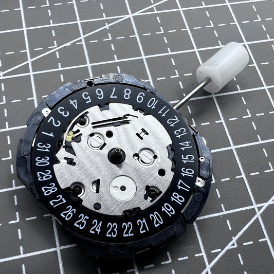 Seiko 7T94A Quartz watch movement close-up showing precise Japanese craftsmanship
