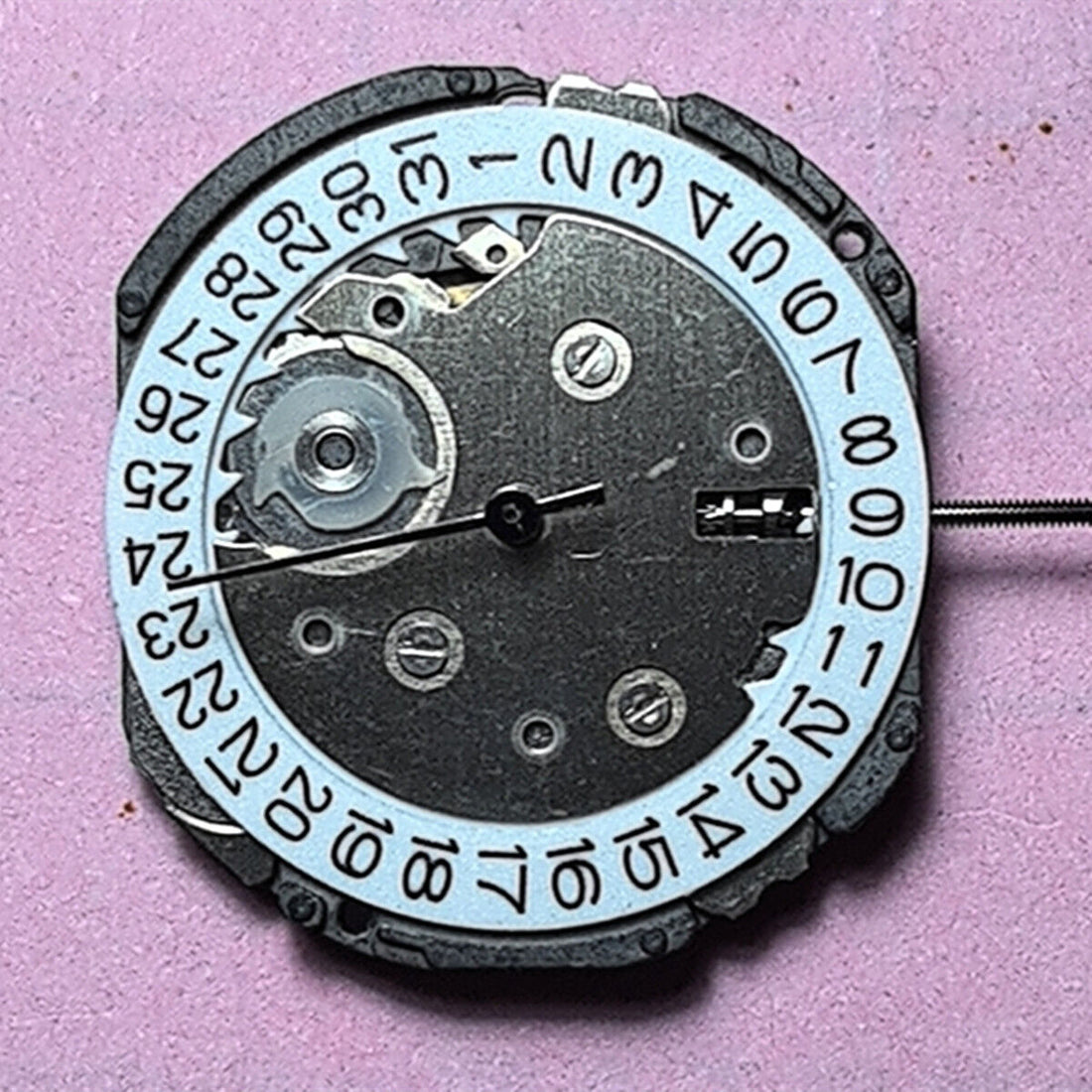 Japan Made 6EC1 quartz watch movement with date at 3, ideal for precise watch repairs.