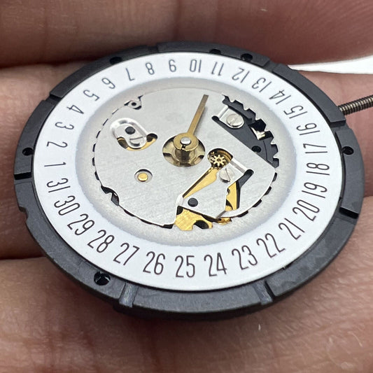 ISA 330 quartz movement with date at 6:00, original watch accessory for precise timekeeping.