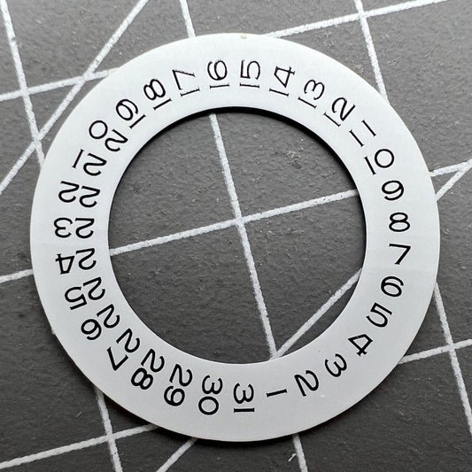 Thickening white date wheel overlay for ETA2824 movement with date window at 3 o'clock.