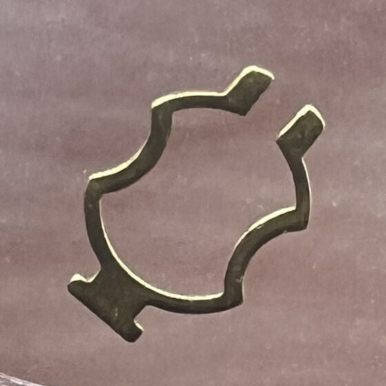 Watch part shock absorber for ETA 2892 balance wheel, enhancing durability and precision.