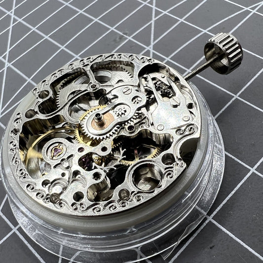 Carved silver hollow watch accessory with 7120 automatic mechanical movement, precision timepiece part