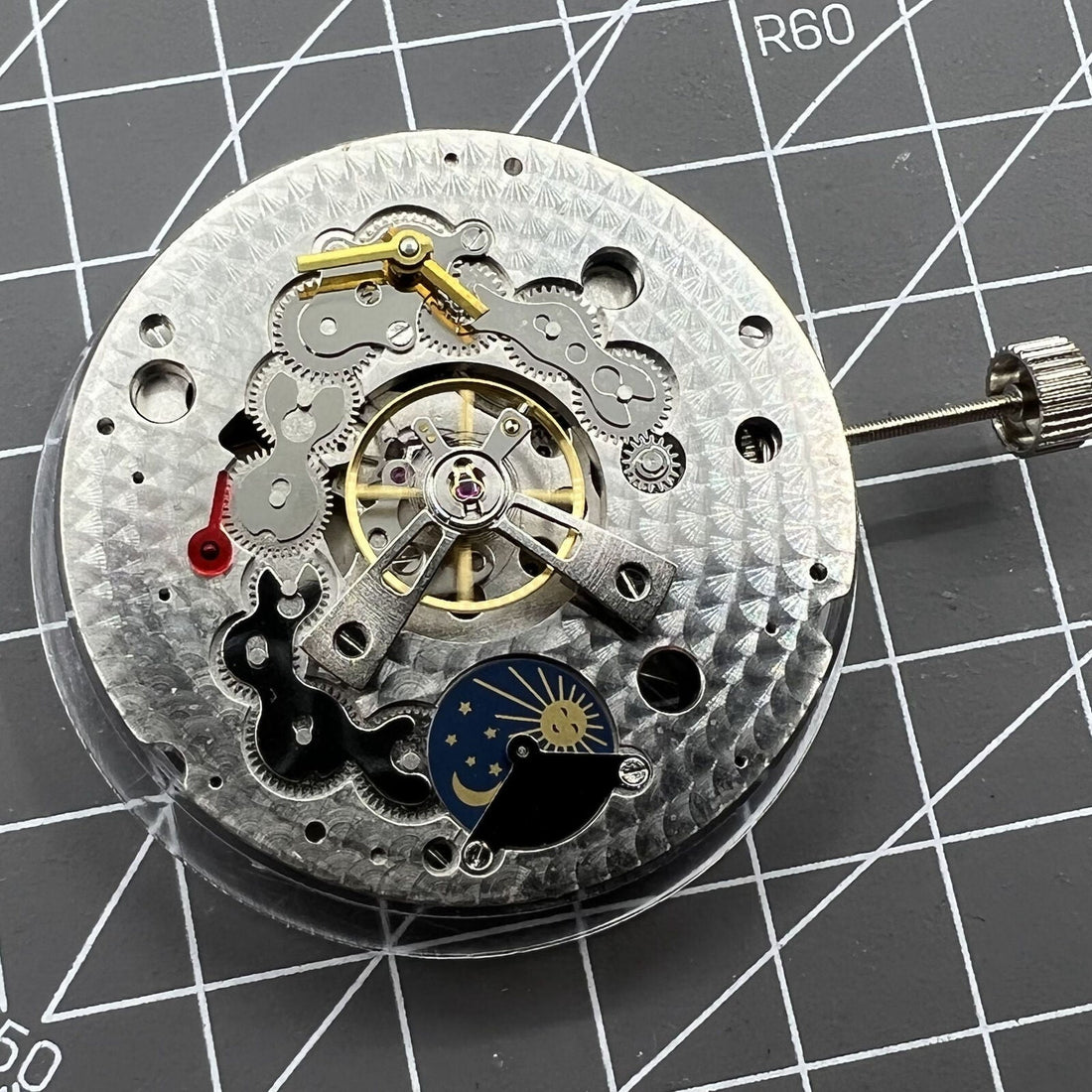 Dandong Silver hollow star and moon phase watch with automatic mechanical movement, China made accessory.