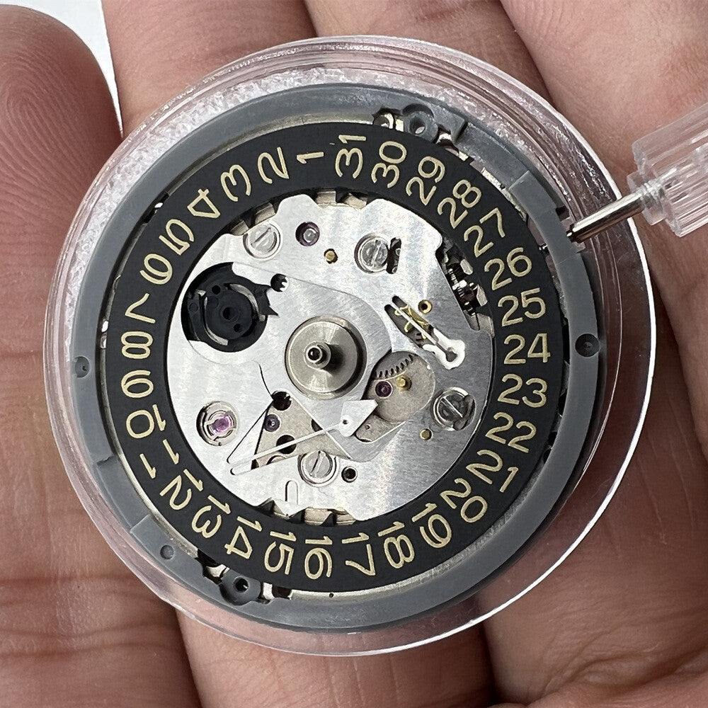 NH35A Japan automatic mechanical watch movement with golden date display, SKX007 style crown at 3 o'clock.