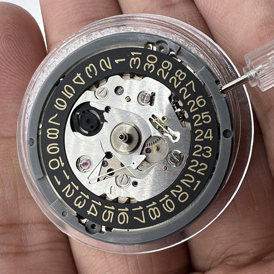 NH35A Japan automatic mechanical watch movement with golden date display, SKX007 style crown at 3 o'clock.
