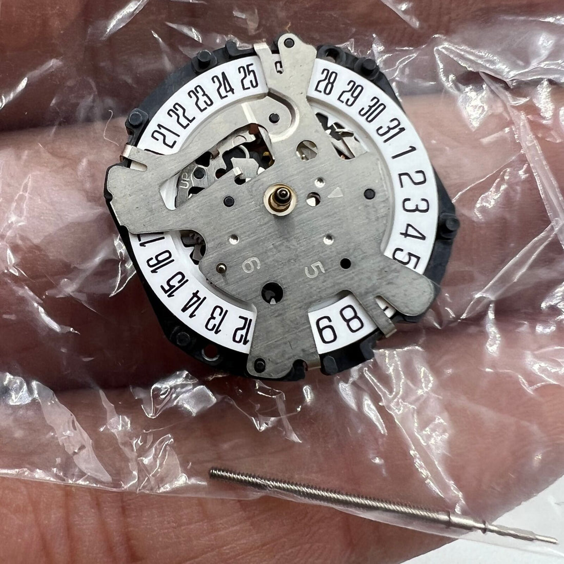 Japan Made Hattori Epson TMI VX16E watch quartz movement, precise timekeeping for watch repairs and assembly.