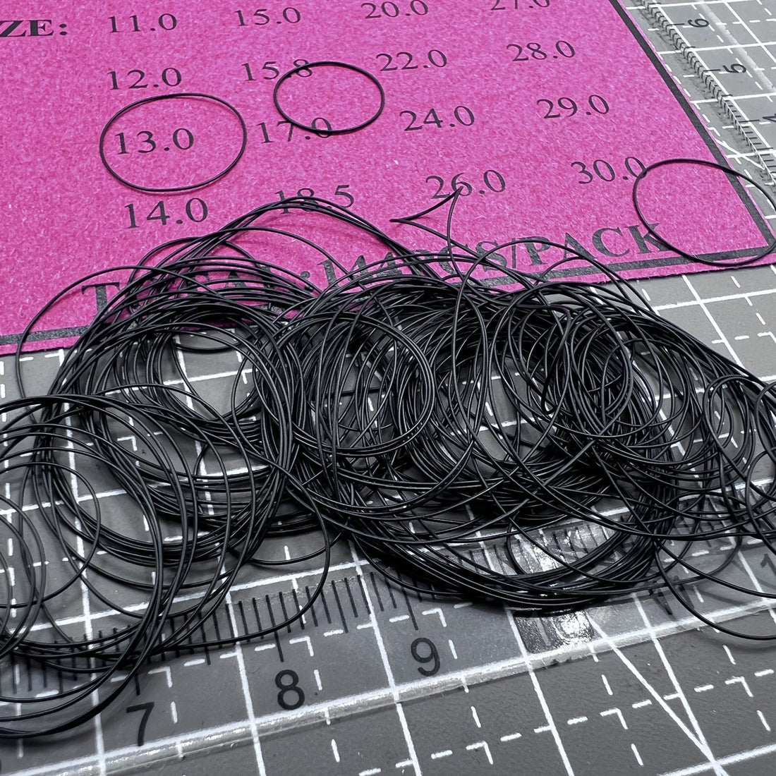 16-piece O-ring set, 0.3mm thick waterproof seals for watch accessories, durable gasket rings.