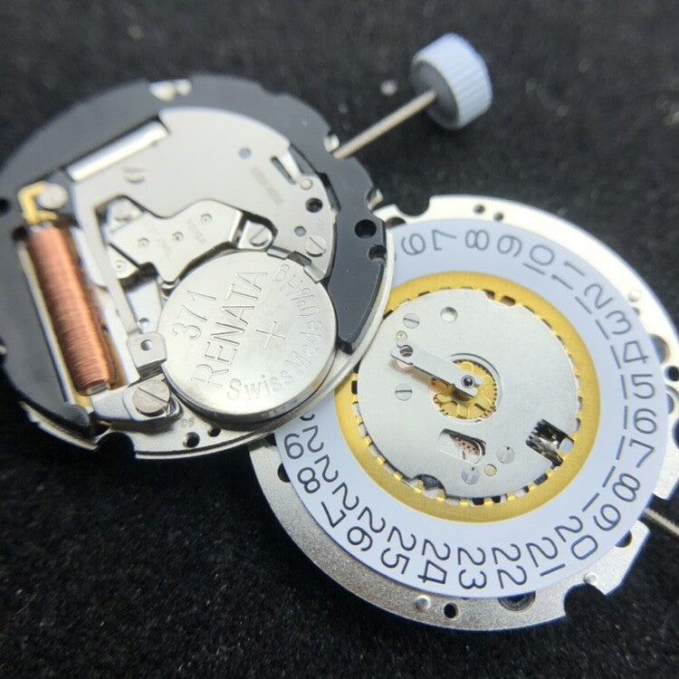 Ronda 705 quartz watch movement with date display at 3 o'clock, precision watch repair part.