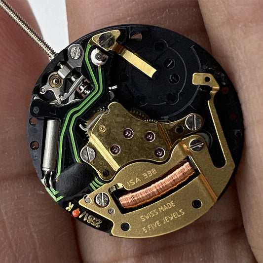 Watchmakers ISA 338 quartz movement repair part, replaces J328/103, precise watch accessory.