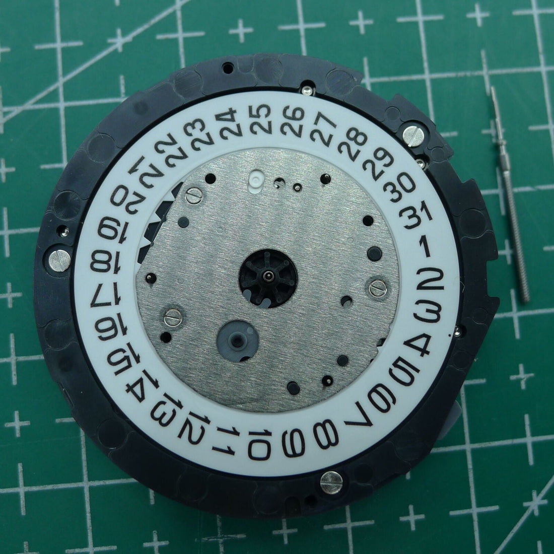 Miyota 6S30 quartz watch movement with date at 4, small seconds at 2, 6, and 10 - reliable precision by Miyota.