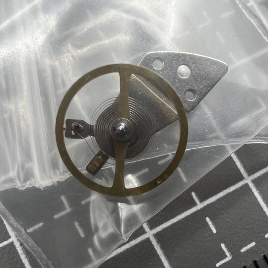 Silver complete balance wheel with splint for Miyota 8200 8215 watch movement, precision replacement part.
