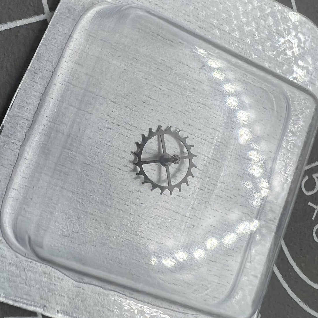 Escape wheel for ETA 2824-2 watch movement, precision replacement part for Swiss timepieces.