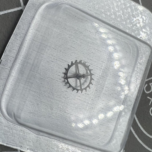 Escape wheel for ETA 2824-2 watch movement, precision replacement part for Swiss timepieces.
