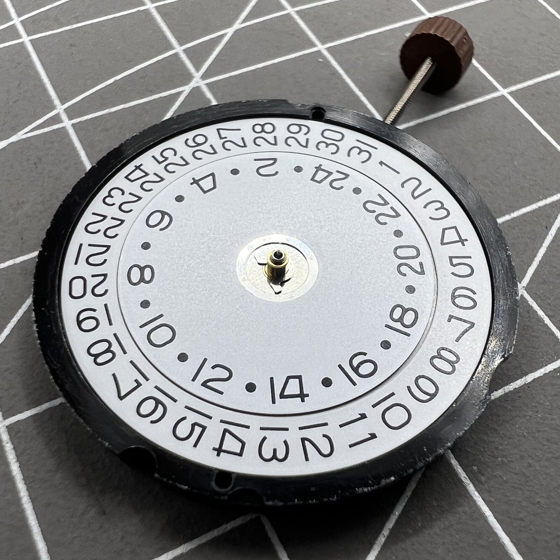 Ronda 515 24D quartz watch movement with date at 3, dual time for precise watch repairs