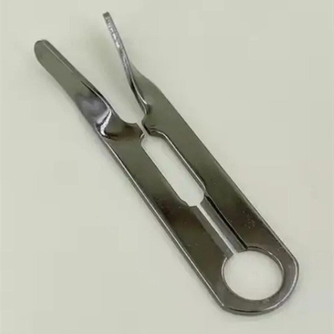 V-slot stainless steel watch roller remover tool by 2810 for precise watch repair and replacement tasks.