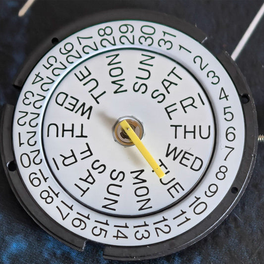 Swiss ISA317 quartz watch movement with 3 hands and double calendar, ideal for precise watch repairs.