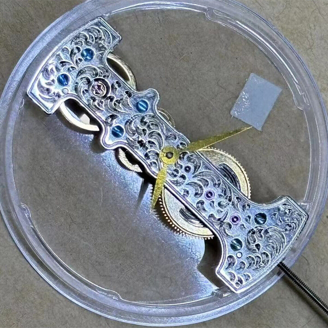 Chinese Strip shaped watch with 2 hands, automatic mechanical movement, carved matte polished finish.